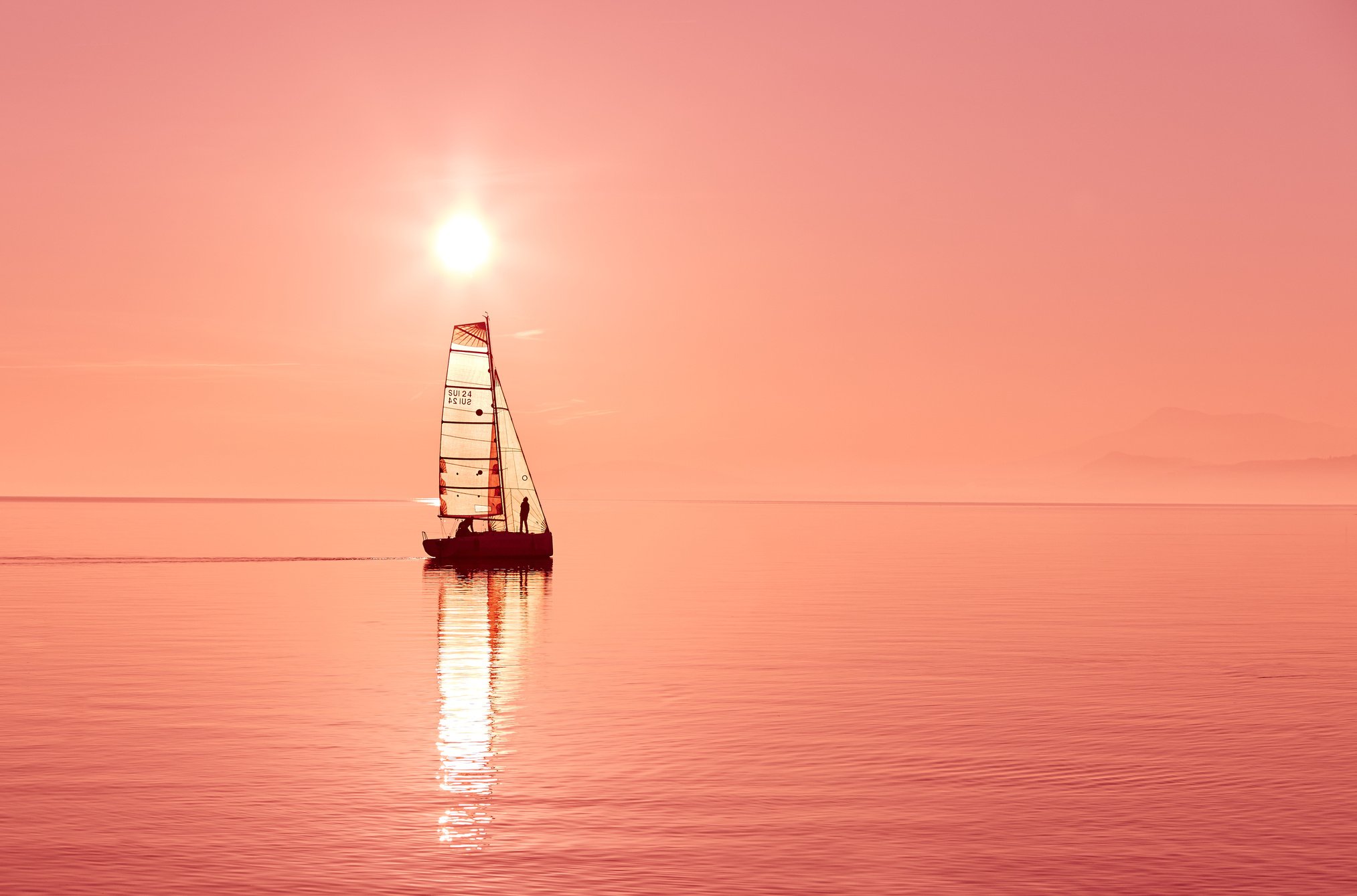 Boat on Body of Water during Sunset